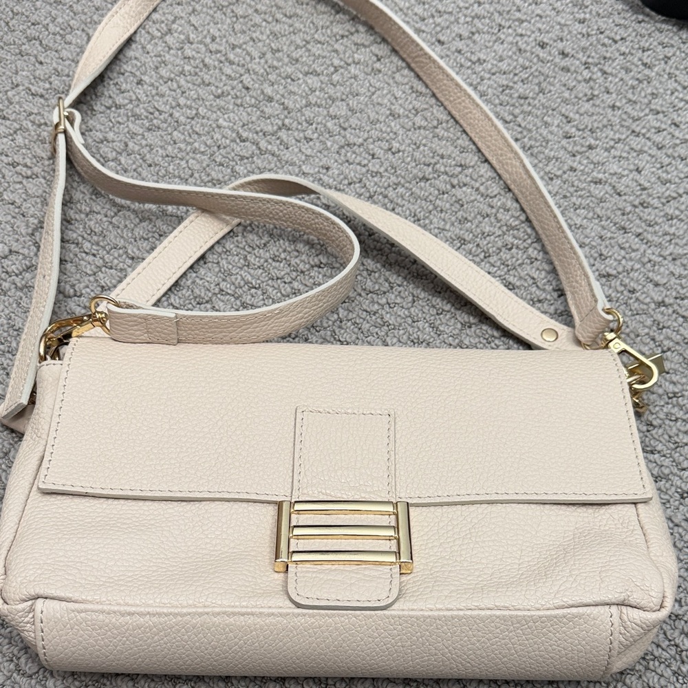 Cream Leather Clutch Gold colored hardware.
